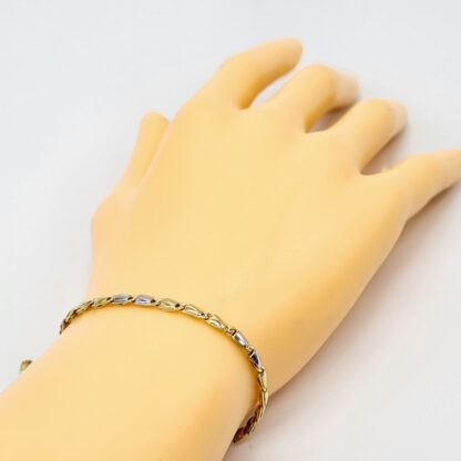 bracciale uomo in oro giallo e oro bianco fantasia