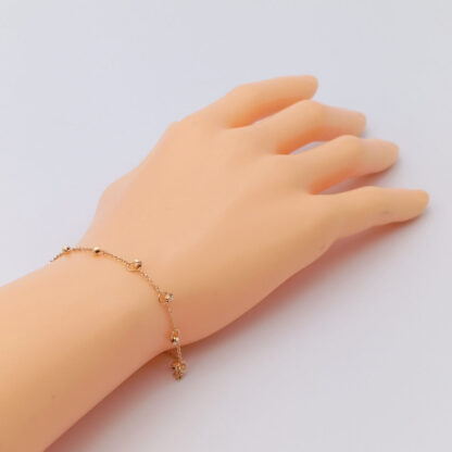 bracciale in oro giallo sfere diamantate