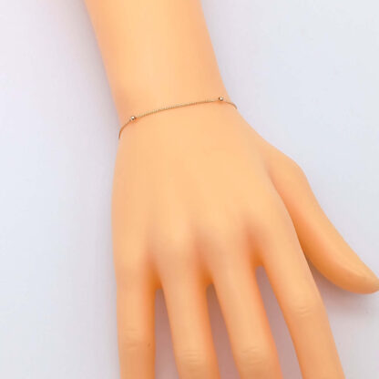 bracciale in oro giallo maglia grumetta con sfere