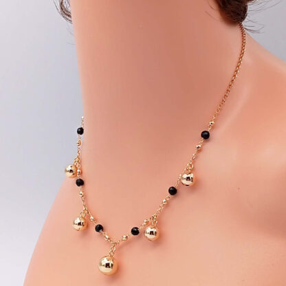 collana girocollo sfere in argento dorato e onice